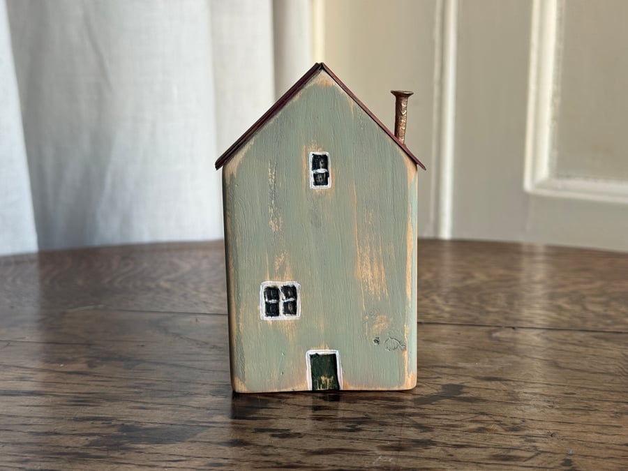 Little Wooden House with a Tin Roof