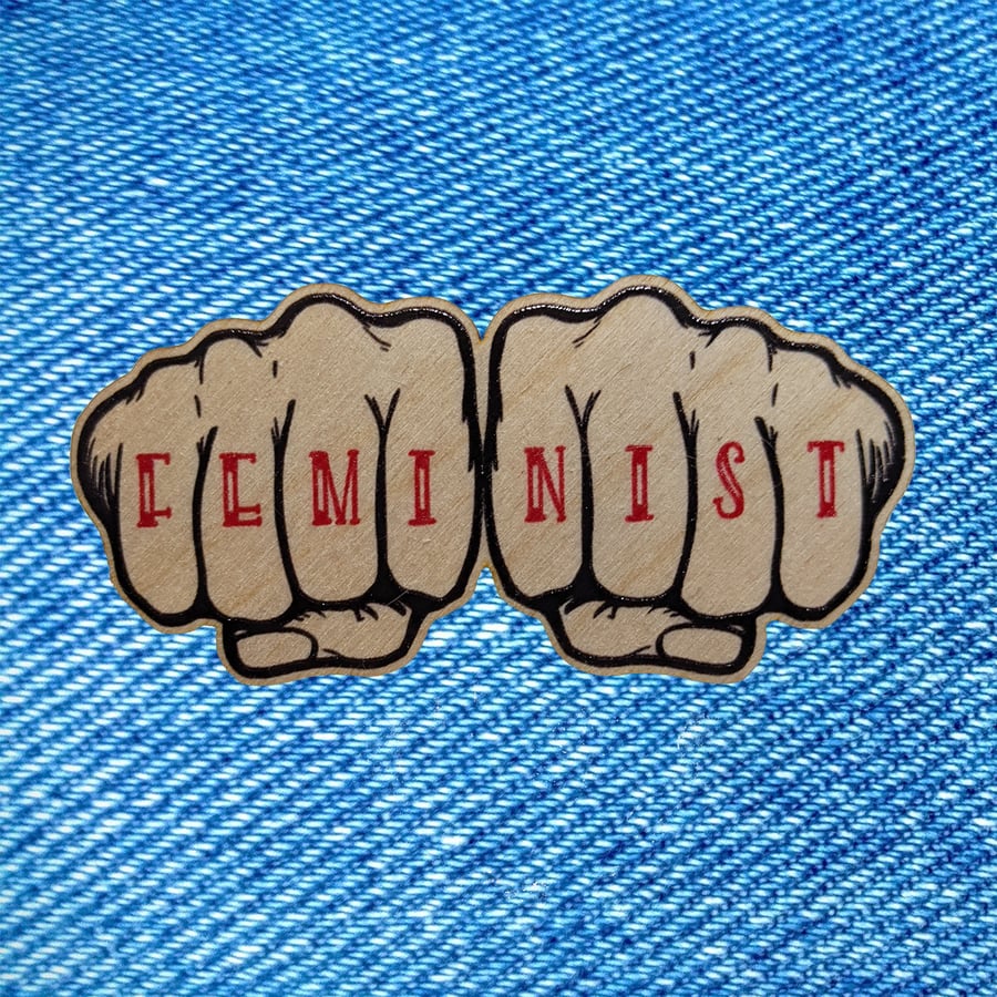 Feminist wooden pin badge tattoo knuckles