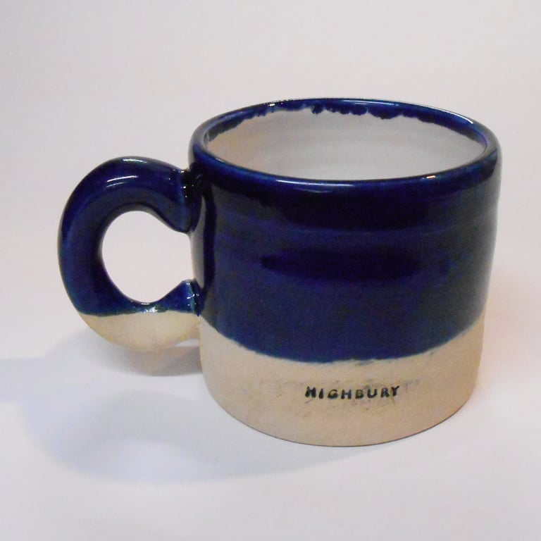 Highbury Logo Mug with Midnight Blue and Shiny Tin white Glaze.