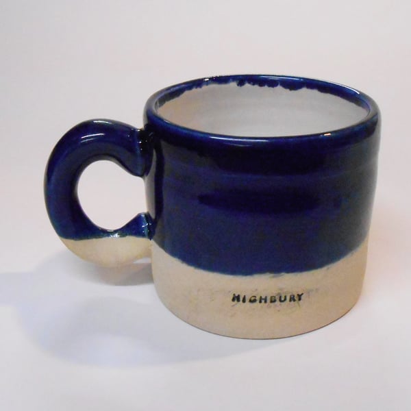 Highbury Logo Mug with Midnight Blue and Shiny Tin white Glaze.