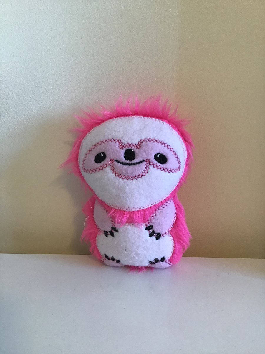 Sloth in shocking pink fur