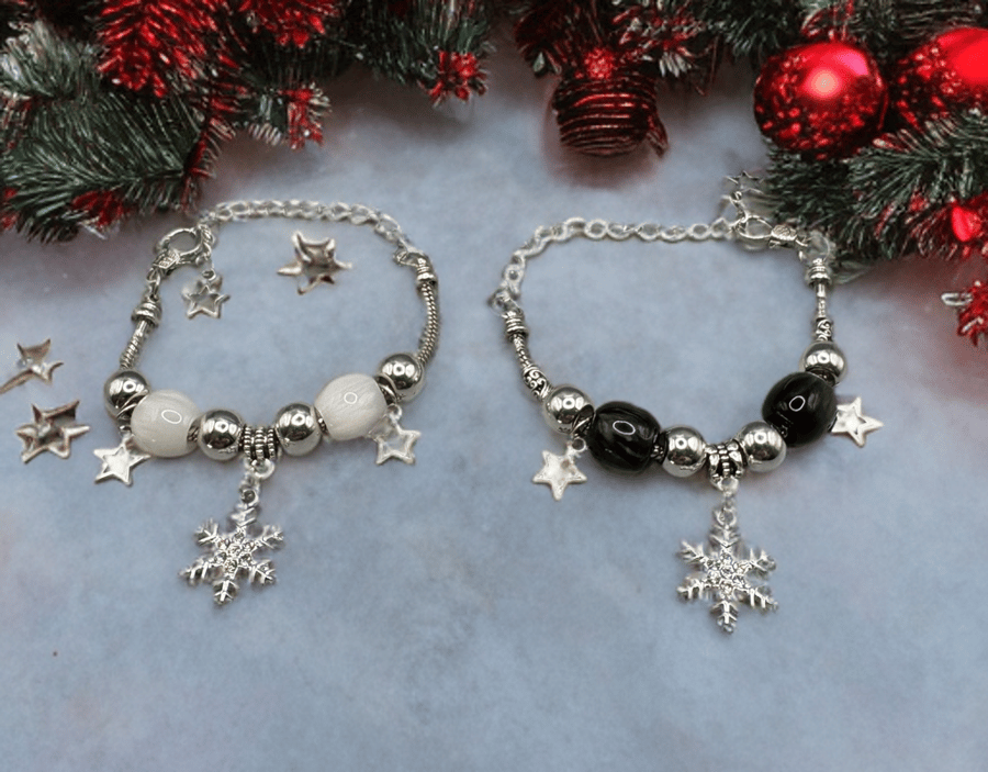 Christmas snowflakes charm bracelet with traditional  colours of red and green 