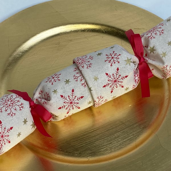 Pick and mix, reusable Christmas Crackers.  Linen-look cream with red snowflakes