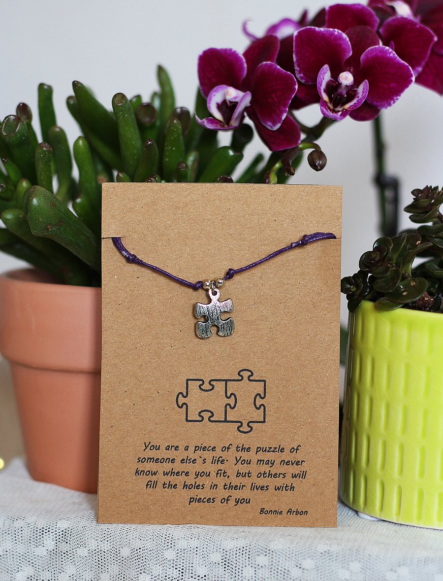 Handmade adjustable friendship bracelet with Tibetan silver jigsaw piece charm