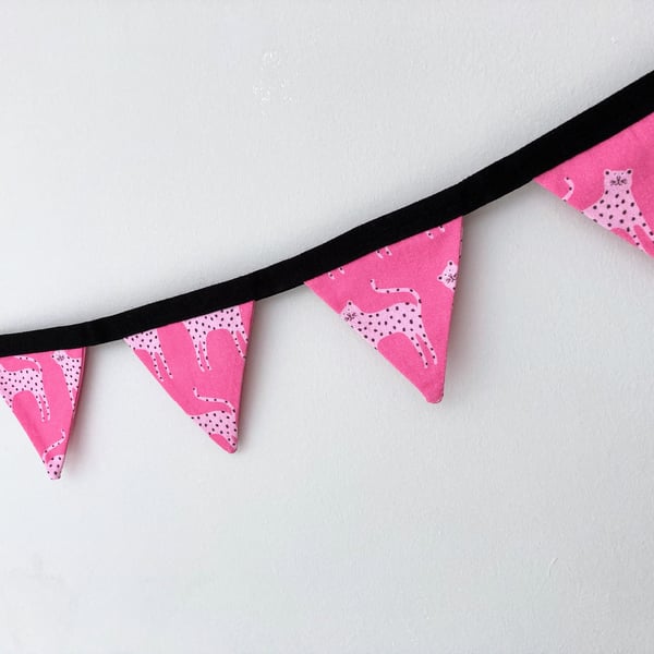 Leopards on bright pink double sided cotton fabric mini bunting.
