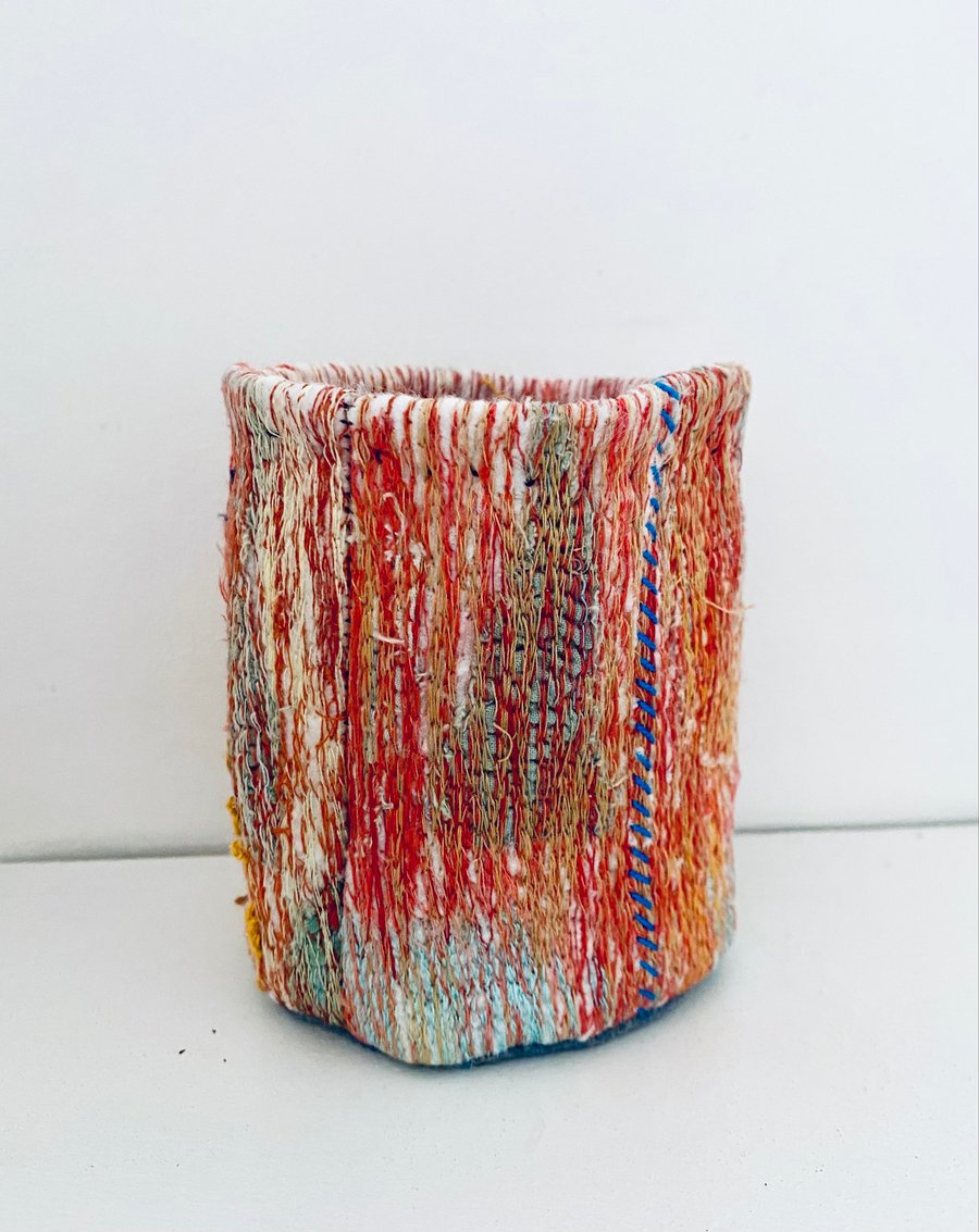 Embroidered textile vessel, colourful plant pot holder
