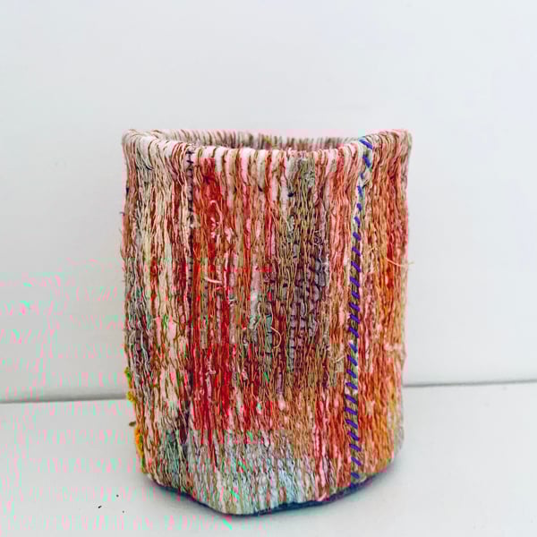 Embroidered textile vessel, colourful plant pot holder