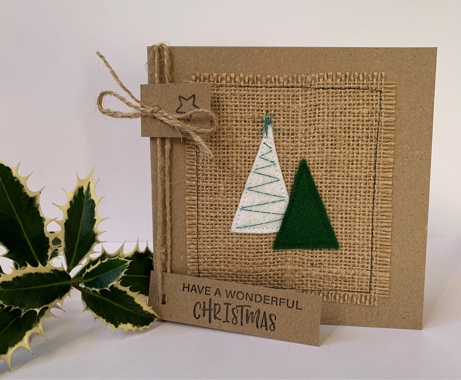 Handmade Christmas Card. Festive trees with sparkle. Christmas greetings. 