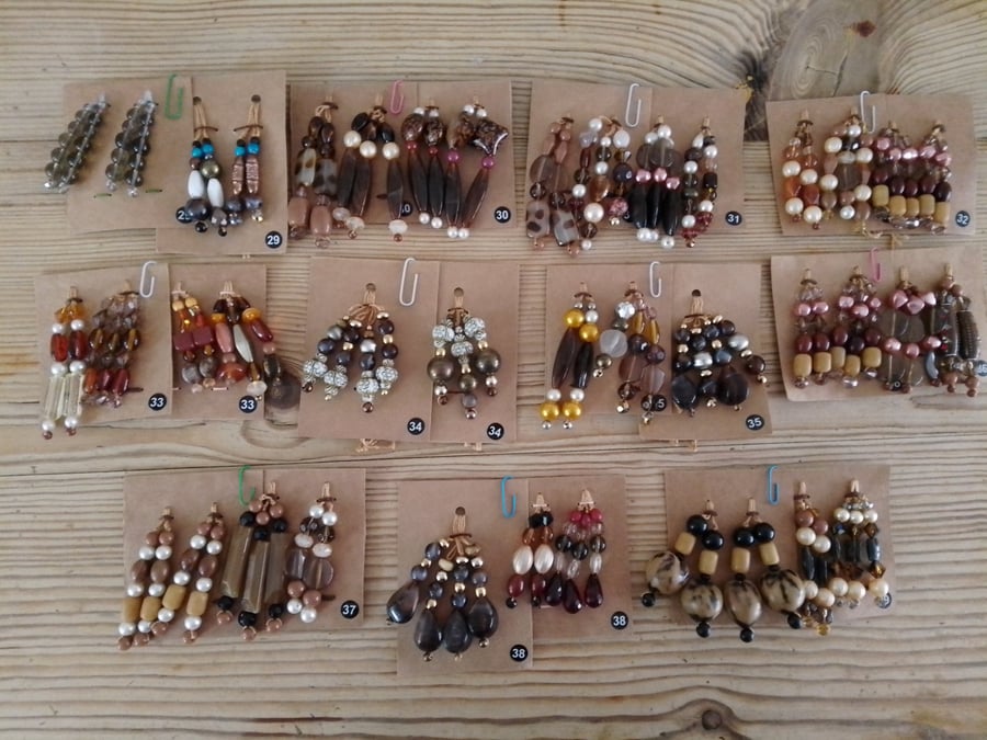 Set of colour coordinated beaded gift decorations