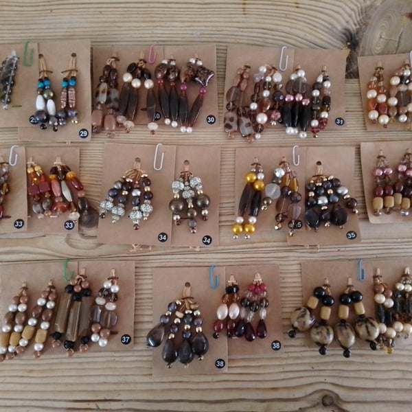 Set of colour coordinated beaded gift decorations