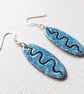 Oval Earrings with wavy line design - Image 3