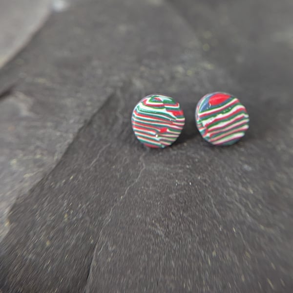 Striped green and red studs