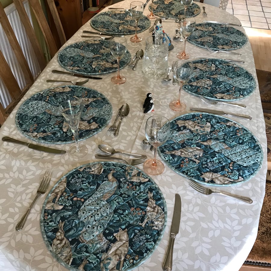 Peacock, Fox & Hare: set of eight quilted placemats, with slipcase