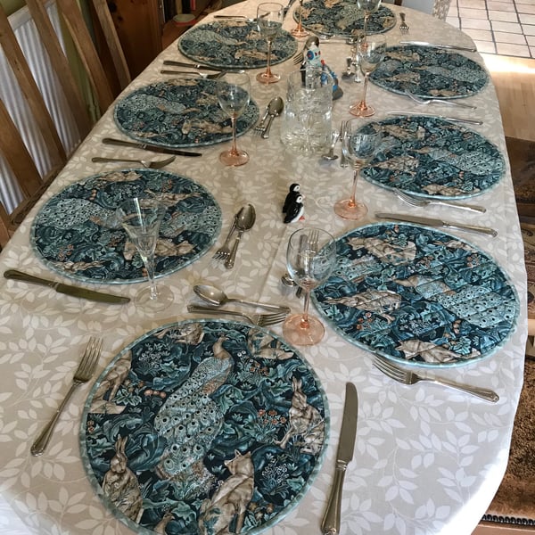 Peacock, Fox & Hare: set of eight quilted placemats, with slipcase