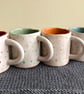 Hand pinched set of 4 spotty espresso cups