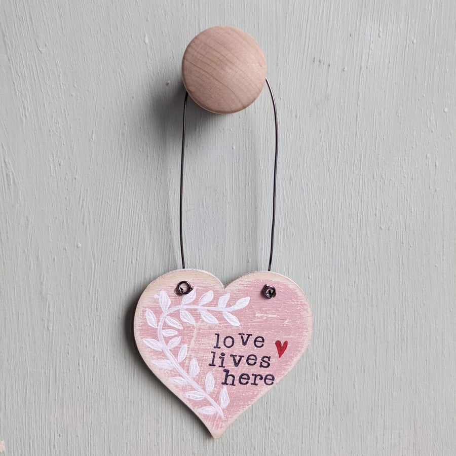 Hand Painted Wooden Heart Hanging Decoration 'Love Lives Here'