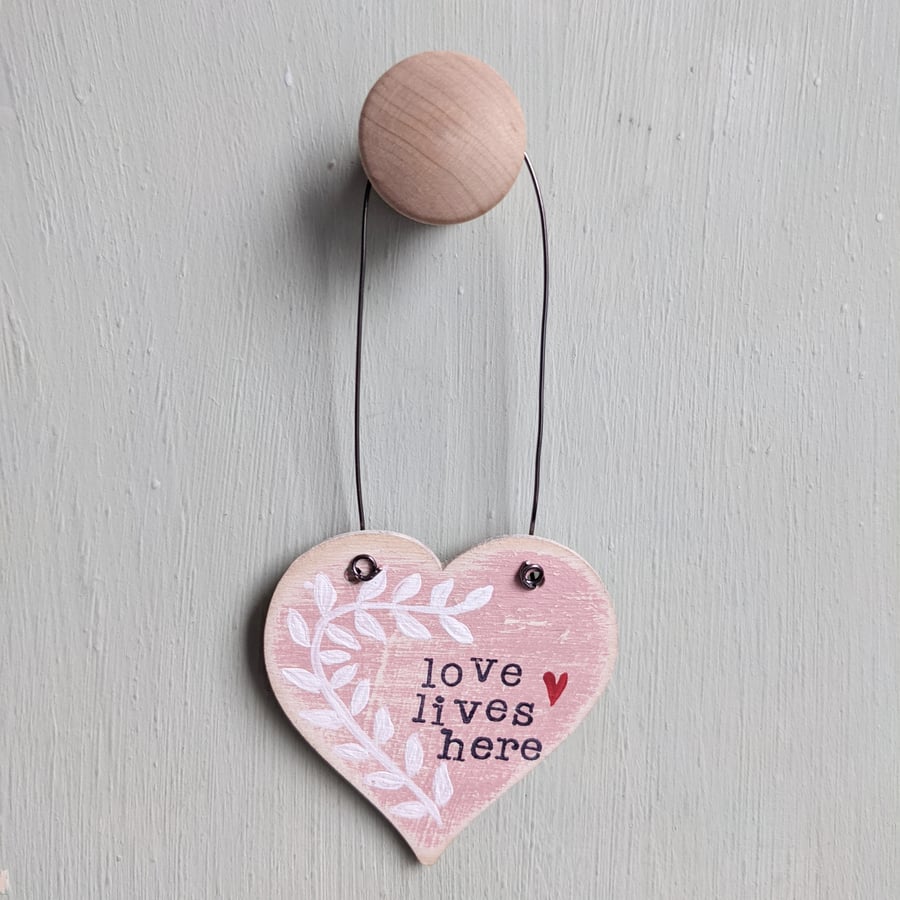 Hand Painted Wooden Heart Hanging Decoration 'Love Lives Here'