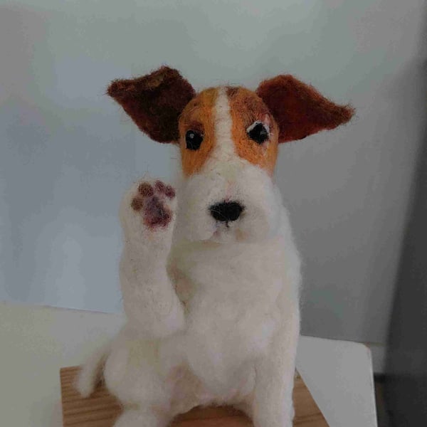 High five. Playful terrier Dog with a ball Needle felt sculpture on oak plinth 