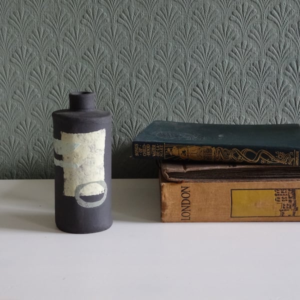 Trish.  Black ceramic dried flower vase, pastel abstract motifs.