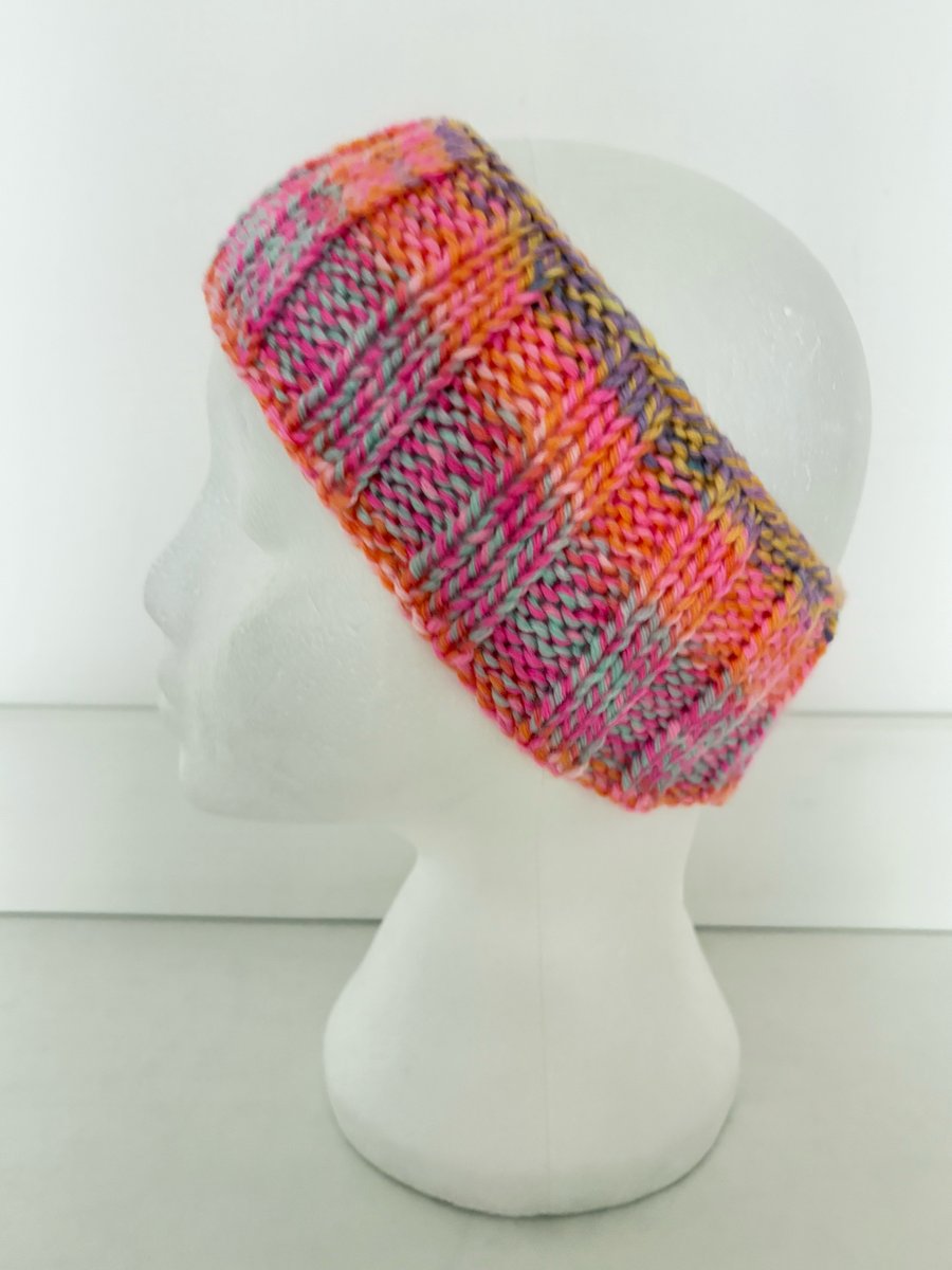 Hand knitted headband. 