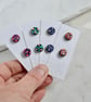Hand painted colourful leopard print wooden circle ear studs - Image 1
