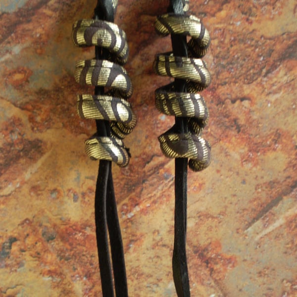  Tassel earrings in Gold and Black recycled leather.