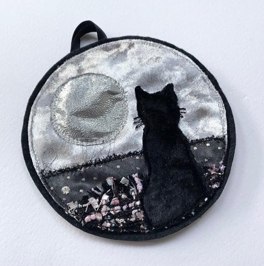 Image of Cat and full moon up cycled seasonal home decoration.