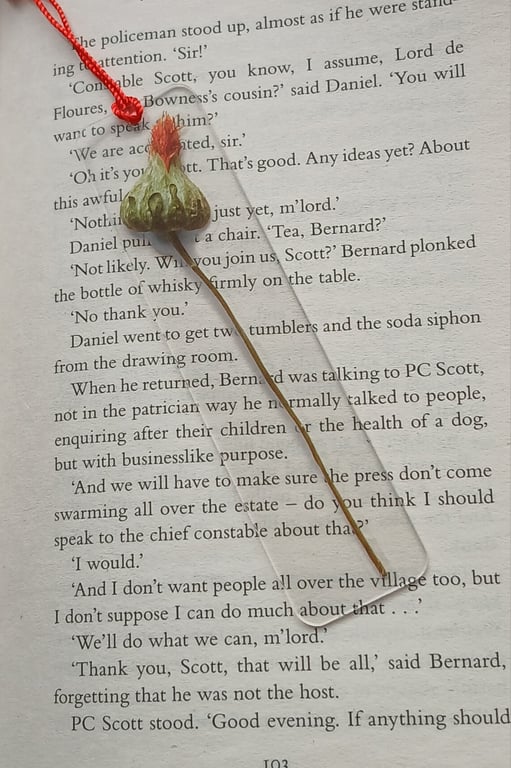 Clear acrylic bookmark decorated with red flowers decals 