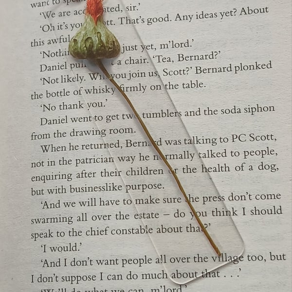 Clear acrylic bookmark decorated with red flowers decals 