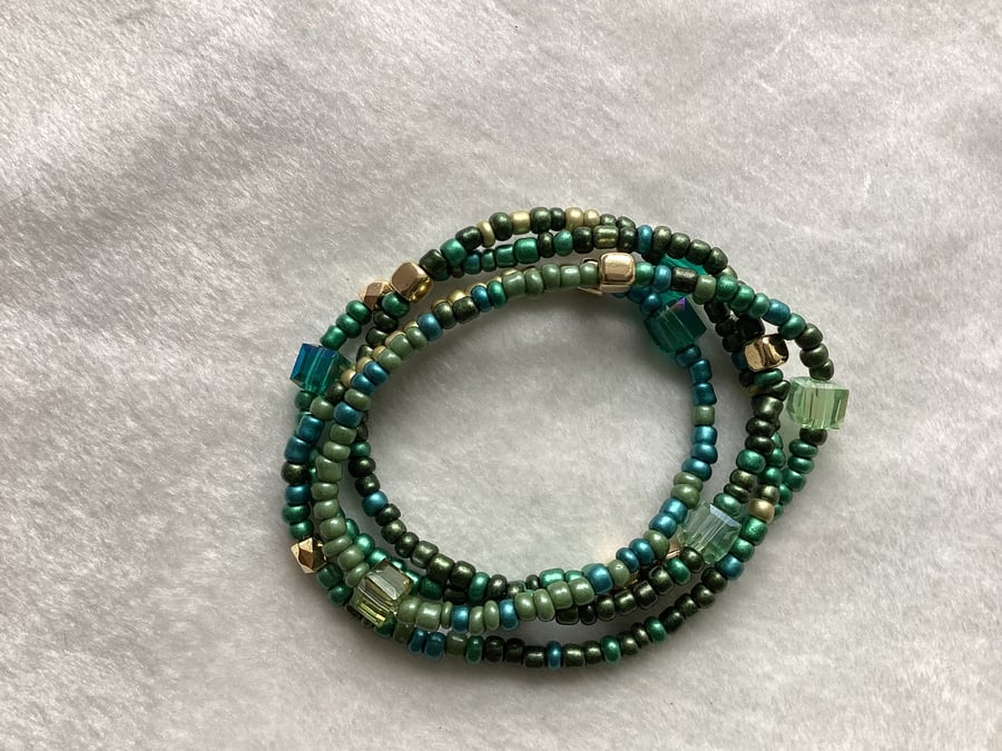 Stretch beaded bracelets from beaded string, square beads.
