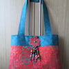 Orange and Teal Floral Batik Handbag