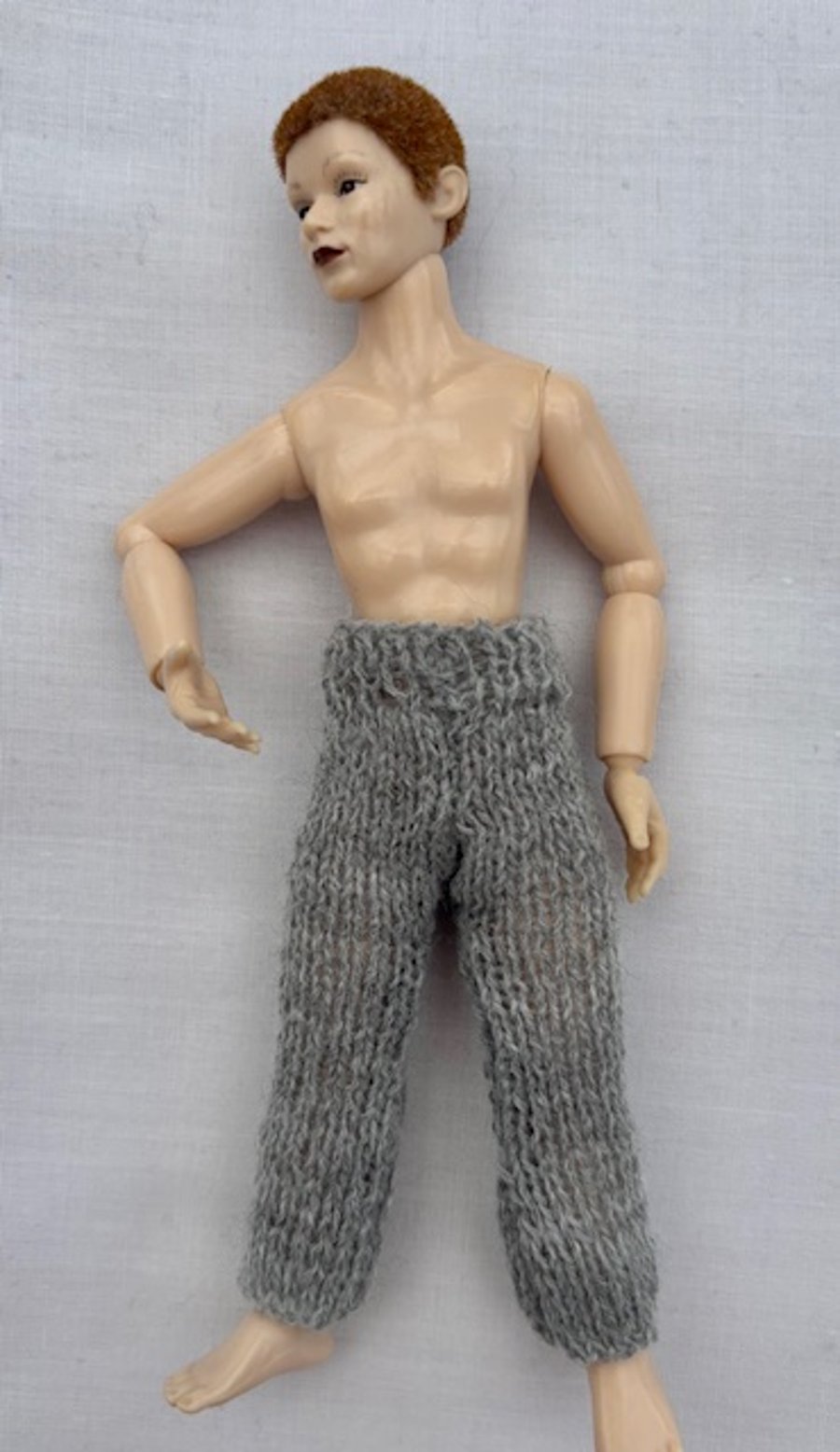 Tiny knitted trousers in miniature 12th scale for the dolls house