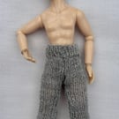 Tiny knitted trousers in miniature 12th scale for the dolls house