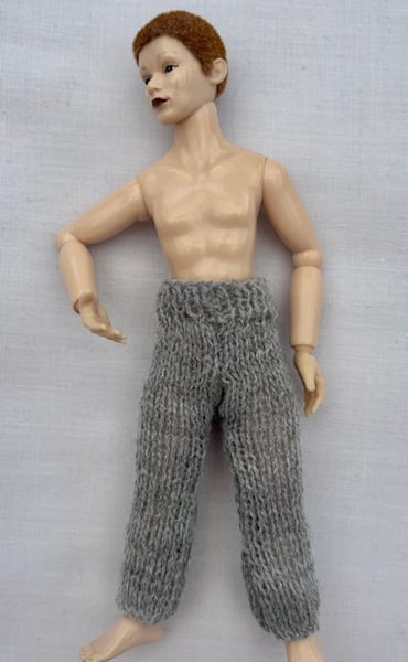 Tiny knitted trousers in miniature 12th scale for the dolls house