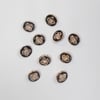 Gold and black faux metal flower shank buttons 15mm approximately. Pack of 10