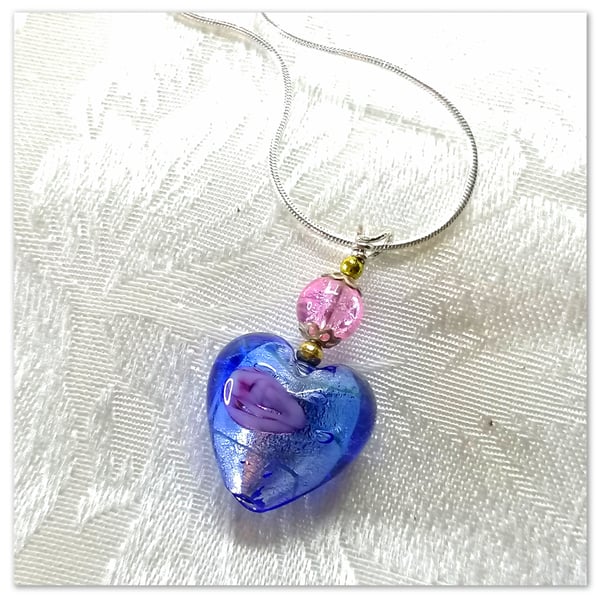 Blue Murano glass heart necklace on a silver plated chain