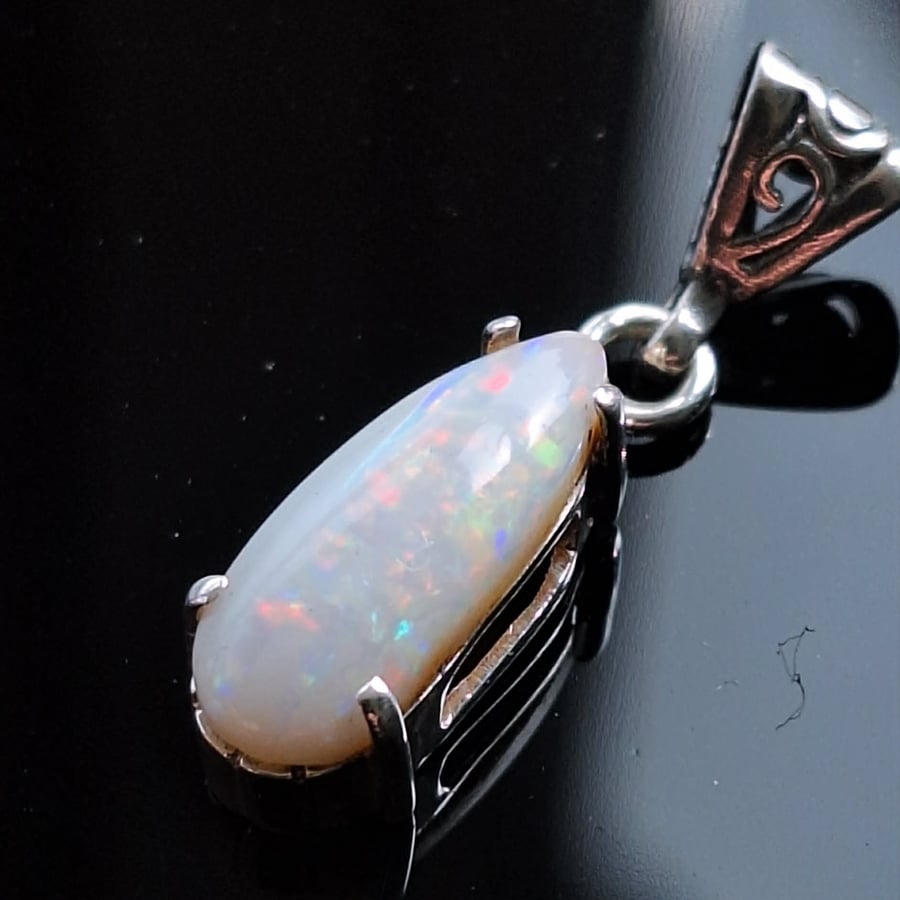 13x6mm 2.5 ct free form CP Olympic opal set in 925 sterling silver 