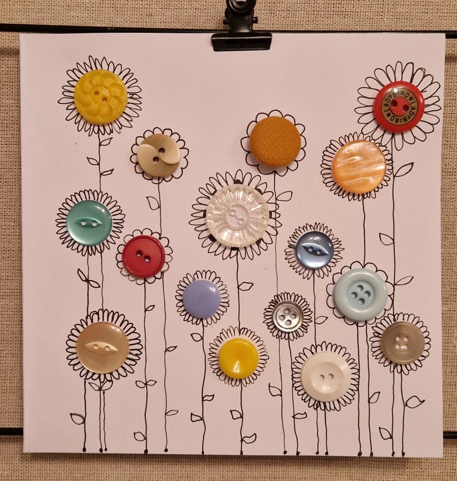 Handmade card flowers using colourful buttons & hand drawn stems & petals