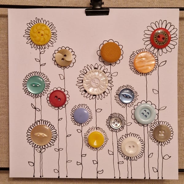 Handmade card flowers using colourful buttons & hand drawn stems & petals