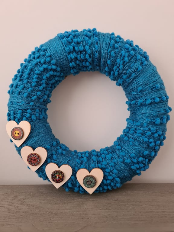 Bobbly blue yarn wrapped wreath 