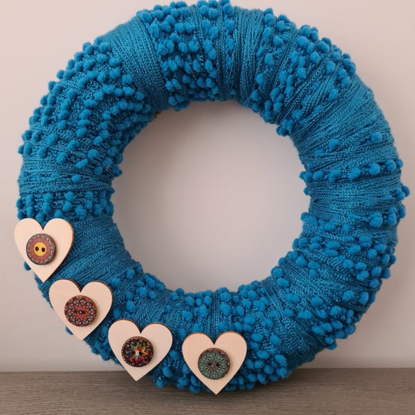 Bobbly blue yarn wrapped wreath 