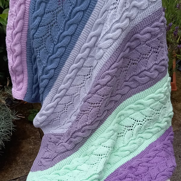 Hand knitted  blanket with cables 