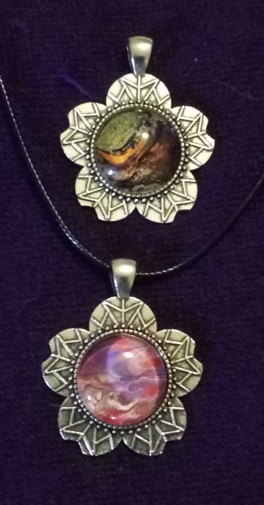 2 for 1 handmade fluid art flower pendants. Copper, red, purple, black and gold.