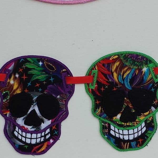 Multi coloured fabric skull bunting