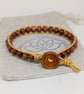 Goldstone and metallic gold leather bracelet with wooden button fastener  - Image 3