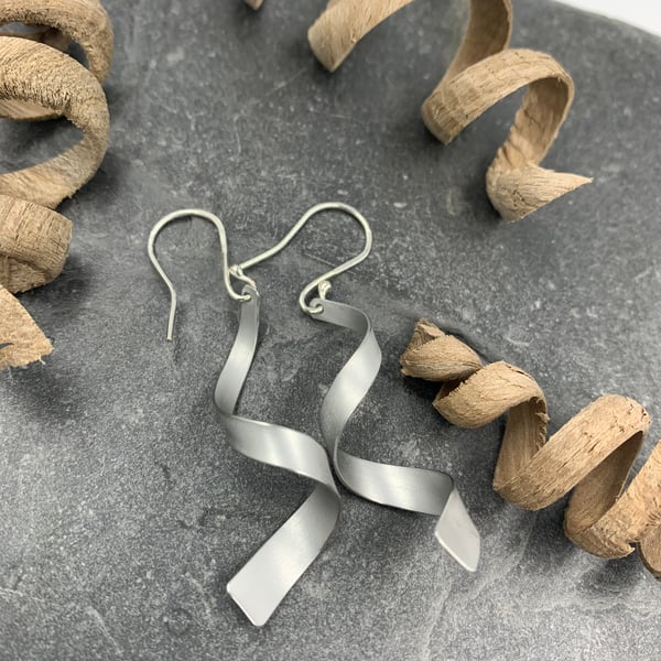 spiral dangly earrings in silver aluminium