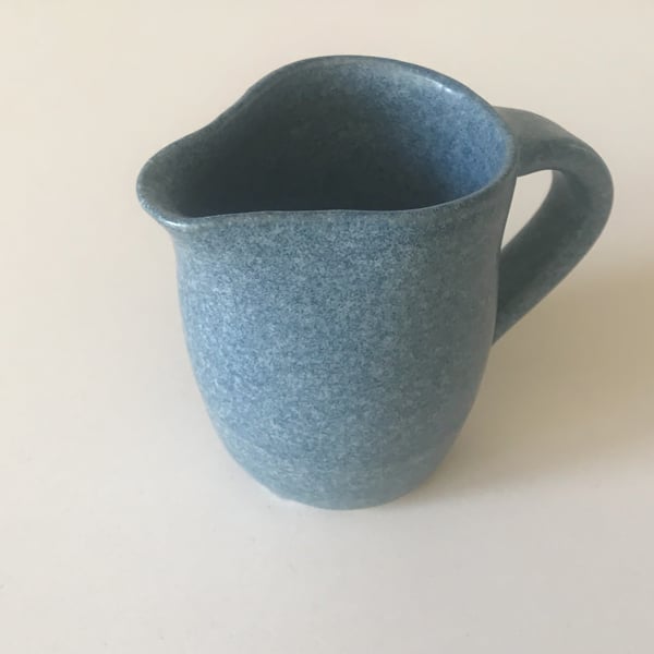Small denim blue creamer or milk jug 
