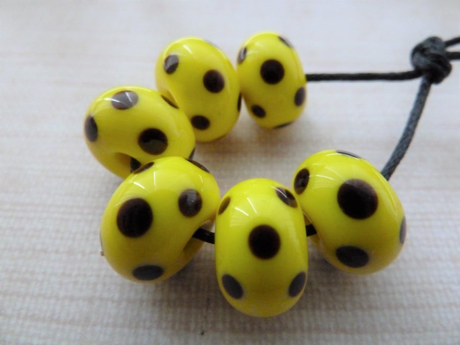 yellow and black spot lampwork glass beads
