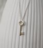 Solid silver small and dainty key charm pendant and chain