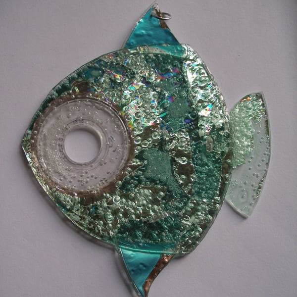 Turquoise, silver and green hanging fish ornament.